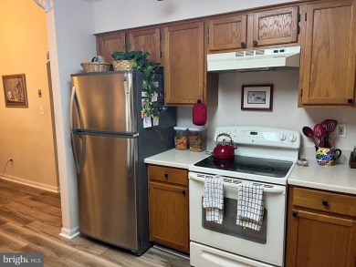 Beautiful two bedroom/two bath townhome with many recent updates on Heritage Harbour Golf Club in Maryland - for sale on GolfHomes.com, golf home, golf lot