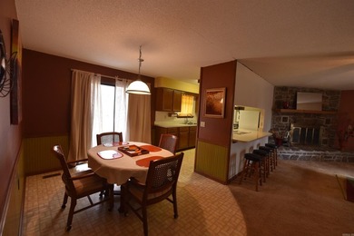 A RARE FIND, a modestly priced 2-bedroom, 2-bathroom home with a on Mountain Ranch Golf Club in Arkansas - for sale on GolfHomes.com, golf home, golf lot