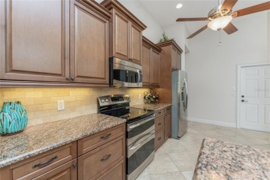 Impressive home with EXPANSIVE VIEWS OF THE GOLF COURSE AND on Saint Andrews South Golf Club in Florida - for sale on GolfHomes.com, golf home, golf lot