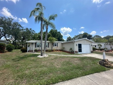 Lot Rent $1037.00 monthly    This beautifully updated home is on Del Tura Golf and Country Club in Florida - for sale on GolfHomes.com, golf home, golf lot
