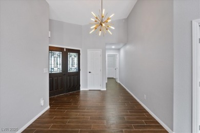 Discover comfortable elegance in the highly sought-after Painted on Painted Desert Golf Club in Nevada - for sale on GolfHomes.com, golf home, golf lot