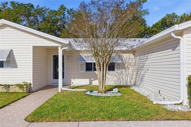 Welcome home to this Holly model 3-bedroom, 2-bath residence in on The Links of Spruce Creek in Florida - for sale on GolfHomes.com, golf home, golf lot
