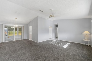 Welcome home to this Holly model 3-bedroom, 2-bath residence in on The Links of Spruce Creek in Florida - for sale on GolfHomes.com, golf home, golf lot