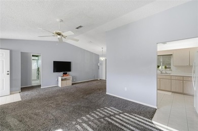 Welcome home to this Holly model 3-bedroom, 2-bath residence in on The Links of Spruce Creek in Florida - for sale on GolfHomes.com, golf home, golf lot