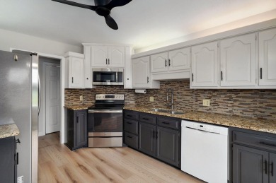 This Marlborough Manor gem offers charm, updates, and a on Horton Smith Golf Course in Missouri - for sale on GolfHomes.com, golf home, golf lot