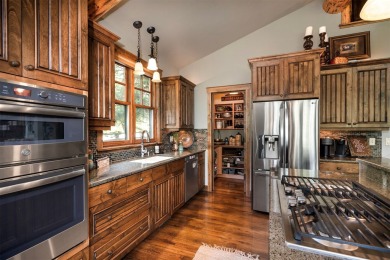 Experience the ultimate in luxury and comfort with this stunning on Eagle Bend Golf Course in Montana - for sale on GolfHomes.com, golf home, golf lot