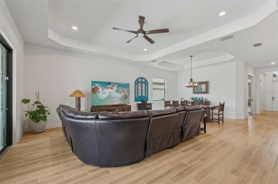 This expansive 2022-built Catalina model in Lakewood National on Lakewood National Golf Club in Florida - for sale on GolfHomes.com, golf home, golf lot