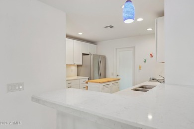 Discover incredible value and modern style in this beautifully on Stardust Golf Course in Arizona - for sale on GolfHomes.com, golf home, golf lot