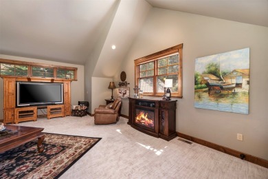 Experience the ultimate in luxury and comfort with this stunning on Eagle Bend Golf Course in Montana - for sale on GolfHomes.com, golf home, golf lot