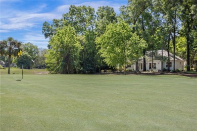 Under contract-accepting backup offers. Nestled amidst the on Haile Plantation Golf and Country Club in Florida - for sale on GolfHomes.com, golf home, golf lot