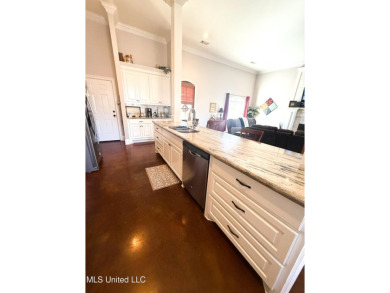 This METICULOUSLY maintained home features a welcoming front on Castlewoods Golf Club in Mississippi - for sale on GolfHomes.com, golf home, golf lot