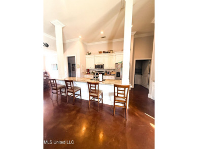 This METICULOUSLY maintained home features a welcoming front on Castlewoods Golf Club in Mississippi - for sale on GolfHomes.com, golf home, golf lot