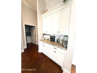 This METICULOUSLY maintained home features a welcoming front on Castlewoods Golf Club in Mississippi - for sale on GolfHomes.com, golf home, golf lot