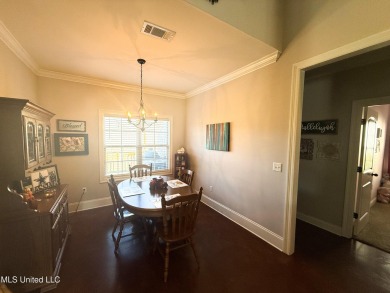 This METICULOUSLY maintained home features a welcoming front on Castlewoods Golf Club in Mississippi - for sale on GolfHomes.com, golf home, golf lot