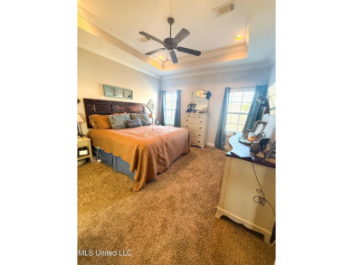This METICULOUSLY maintained home features a welcoming front on Castlewoods Golf Club in Mississippi - for sale on GolfHomes.com, golf home, golf lot