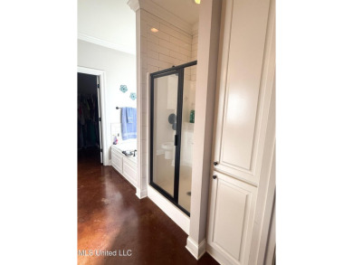 This METICULOUSLY maintained home features a welcoming front on Castlewoods Golf Club in Mississippi - for sale on GolfHomes.com, golf home, golf lot