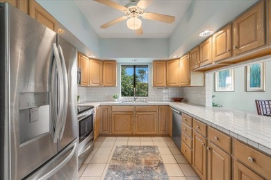 Tucked away on a flag lot, this sun-drenched 4-bedroom, 3-bath on Pukalani Country Club in Hawaii - for sale on GolfHomes.com, golf home, golf lot