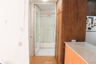 Located in the highly sought-after 55+ gated community of on Leisure World Seal Beach Golf Course in California - for sale on GolfHomes.com, golf home, golf lot