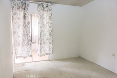 Located in the highly sought-after 55+ gated community of on Leisure World Seal Beach Golf Course in California - for sale on GolfHomes.com, golf home, golf lot