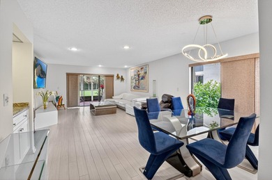 Welcome to your charming first-floor corner unit with beautiful on Hunters Run Golf and Country Club in Florida - for sale on GolfHomes.com, golf home, golf lot