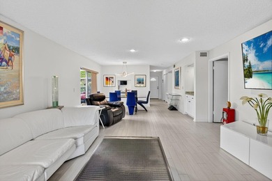 Welcome to your charming first-floor corner unit with beautiful on Hunters Run Golf and Country Club in Florida - for sale on GolfHomes.com, golf home, golf lot