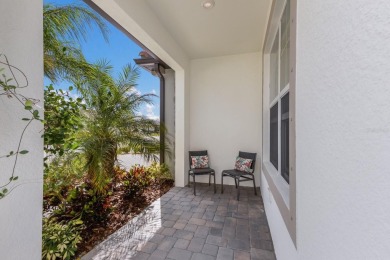 PRICE IMPROVEMENT!  WATERFRONT VILLA IN HIGHLY SOUGHT AFTER on Esplanade Golf and Country at Lakewood Ranch in Florida - for sale on GolfHomes.com, golf home, golf lot