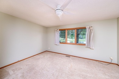 Trapper Woods Condo at Canadian Lakes.  High demand property on Canadian Lakes Country Club-The Pines Course in Michigan - for sale on GolfHomes.com, golf home, golf lot