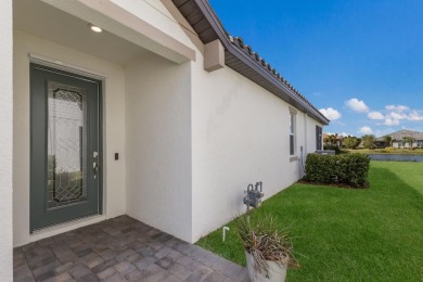 PRICE IMPROVEMENT!  WATERFRONT VILLA IN HIGHLY SOUGHT AFTER on Esplanade Golf and Country at Lakewood Ranch in Florida - for sale on GolfHomes.com, golf home, golf lot