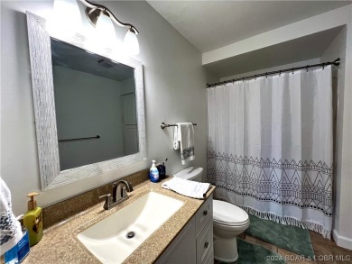 Very nice, updated lake view condo with boat slip in Waters Edge on Seasons Ridge At Four Seasons in Missouri - for sale on GolfHomes.com, golf home, golf lot