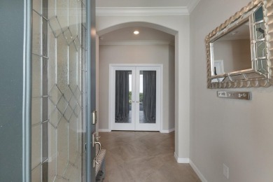 PRICE IMPROVEMENT!  WATERFRONT VILLA IN HIGHLY SOUGHT AFTER on Esplanade Golf and Country at Lakewood Ranch in Florida - for sale on GolfHomes.com, golf home, golf lot