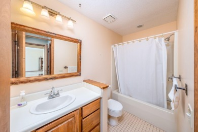 Trapper Woods Condo at Canadian Lakes.  High demand property on Canadian Lakes Country Club-The Pines Course in Michigan - for sale on GolfHomes.com, golf home, golf lot