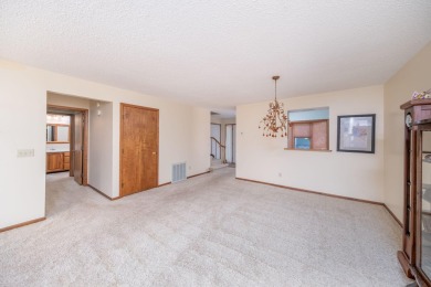 Trapper Woods Condo at Canadian Lakes.  High demand property on Canadian Lakes Country Club-The Pines Course in Michigan - for sale on GolfHomes.com, golf home, golf lot