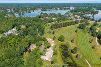 Trapper Woods Condo at Canadian Lakes.  High demand property on Canadian Lakes Country Club-The Pines Course in Michigan - for sale on GolfHomes.com, golf home, golf lot