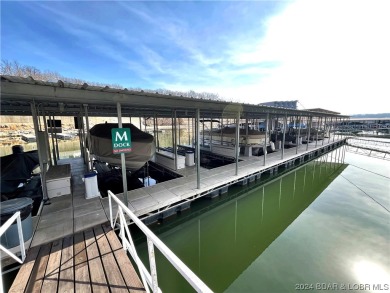 Very nice, updated lake view condo with boat slip in Waters Edge on Seasons Ridge At Four Seasons in Missouri - for sale on GolfHomes.com, golf home, golf lot