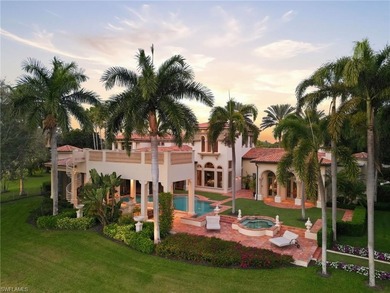 Experience true luxury living on one of the most premier lake on Quail West Golf and Country Club in Florida - for sale on GolfHomes.com, golf home, golf lot