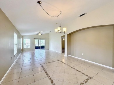 One or more photo(s) has been virtually staged. Lovely Cabernet on Poinciana Golf Club in Florida - for sale on GolfHomes.com, golf home, golf lot