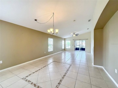 One or more photo(s) has been virtually staged. Lovely Cabernet on Poinciana Golf Club in Florida - for sale on GolfHomes.com, golf home, golf lot