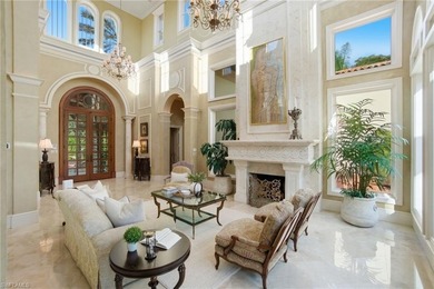 Experience true luxury living on one of the most premier lake on Quail West Golf and Country Club in Florida - for sale on GolfHomes.com, golf home, golf lot