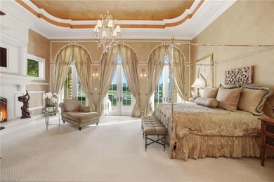 Experience true luxury living on one of the most premier lake on Quail West Golf and Country Club in Florida - for sale on GolfHomes.com, golf home, golf lot