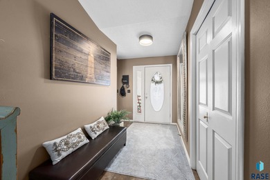 This south-side stunner sits on an oversized, private lot and on Prairie Green Golf Course in South Dakota - for sale on GolfHomes.com, golf home, golf lot