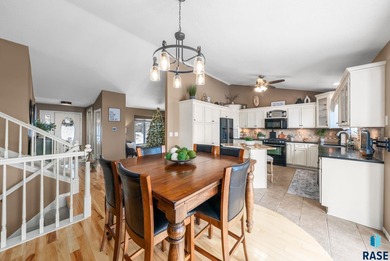 This south-side stunner sits on an oversized, private lot and on Prairie Green Golf Course in South Dakota - for sale on GolfHomes.com, golf home, golf lot