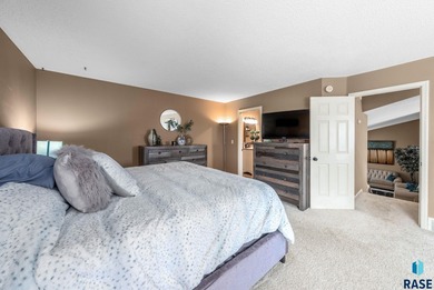 This south-side stunner sits on an oversized, private lot and on Prairie Green Golf Course in South Dakota - for sale on GolfHomes.com, golf home, golf lot