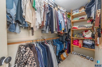 This south-side stunner sits on an oversized, private lot and on Prairie Green Golf Course in South Dakota - for sale on GolfHomes.com, golf home, golf lot