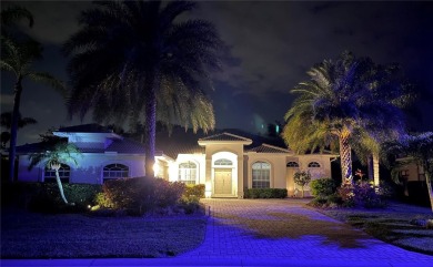 Where Luxury Overlooks the Fairway -- Turnkey Pool Home with on River Strand Golf and Country Club At Heritage Harbour  in Florida - for sale on GolfHomes.com, golf home, golf lot