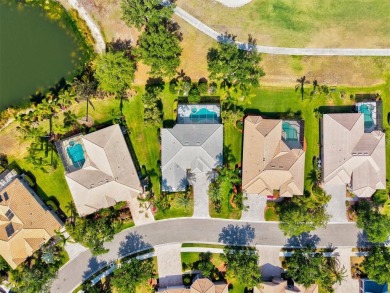 Where Luxury Overlooks the Fairway -- Turnkey Pool Home with on River Strand Golf and Country Club At Heritage Harbour  in Florida - for sale on GolfHomes.com, golf home, golf lot