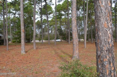 Build your dream house on this exceptional lot situated on on Sea Trail Golf Resort in North Carolina - for sale on GolfHomes.com, golf home, golf lot