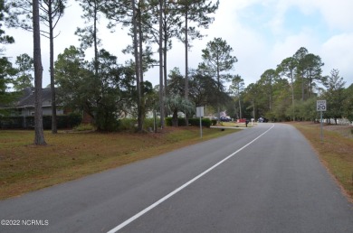 Build your dream house on this exceptional lot situated on on Sea Trail Golf Resort in North Carolina - for sale on GolfHomes.com, golf home, golf lot