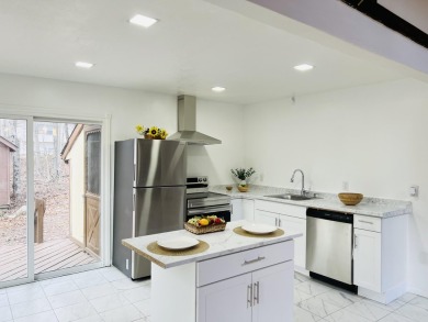 Escape to the Poconos in this beautifully updated 3-bedroom on Pocono Farms Country Club in Pennsylvania - for sale on GolfHomes.com, golf home, golf lot