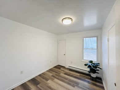 Escape to the Poconos in this beautifully updated 3-bedroom on Pocono Farms Country Club in Pennsylvania - for sale on GolfHomes.com, golf home, golf lot