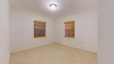 Embrace the quintessential Miami Beach lifestyle in this on Normandy Shores Golf Course in Florida - for sale on GolfHomes.com, golf home, golf lot